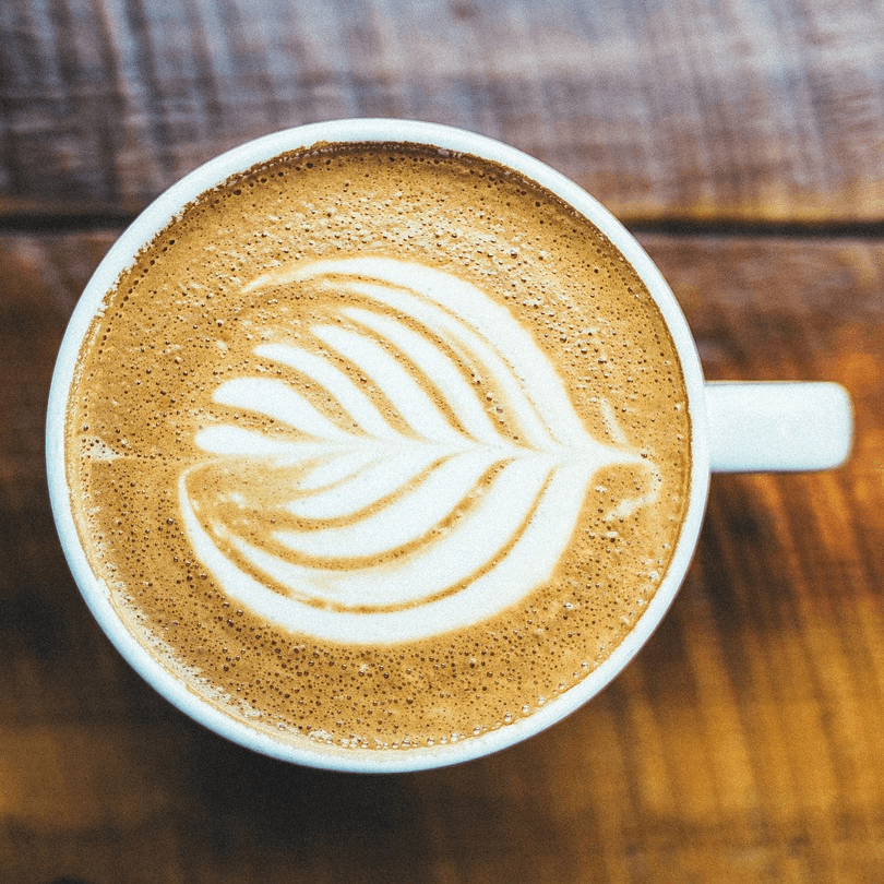 Latte with steamed milk art